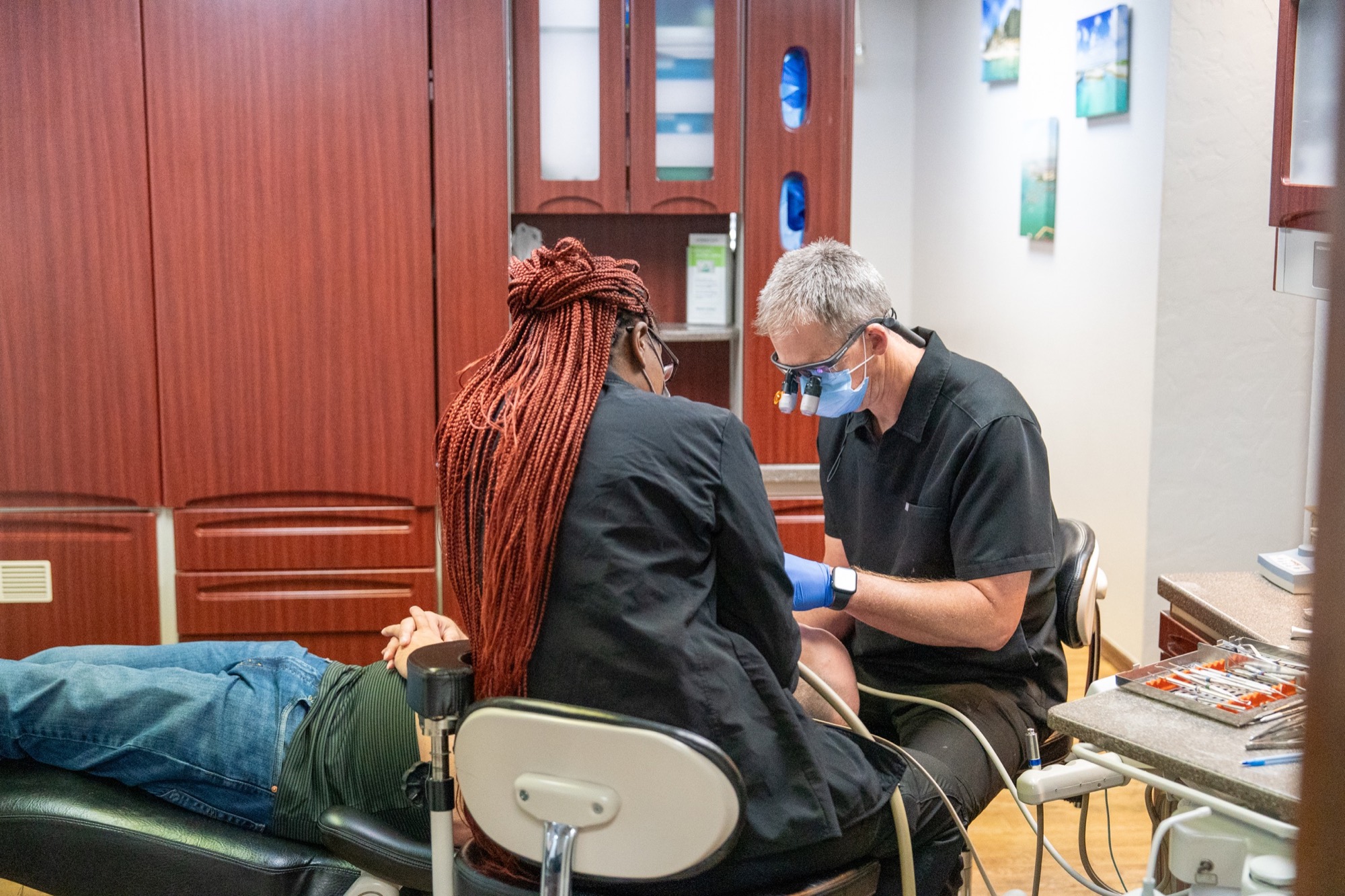 Progressive Dental team providing attentive dental care in an Oklahoma City treatment room